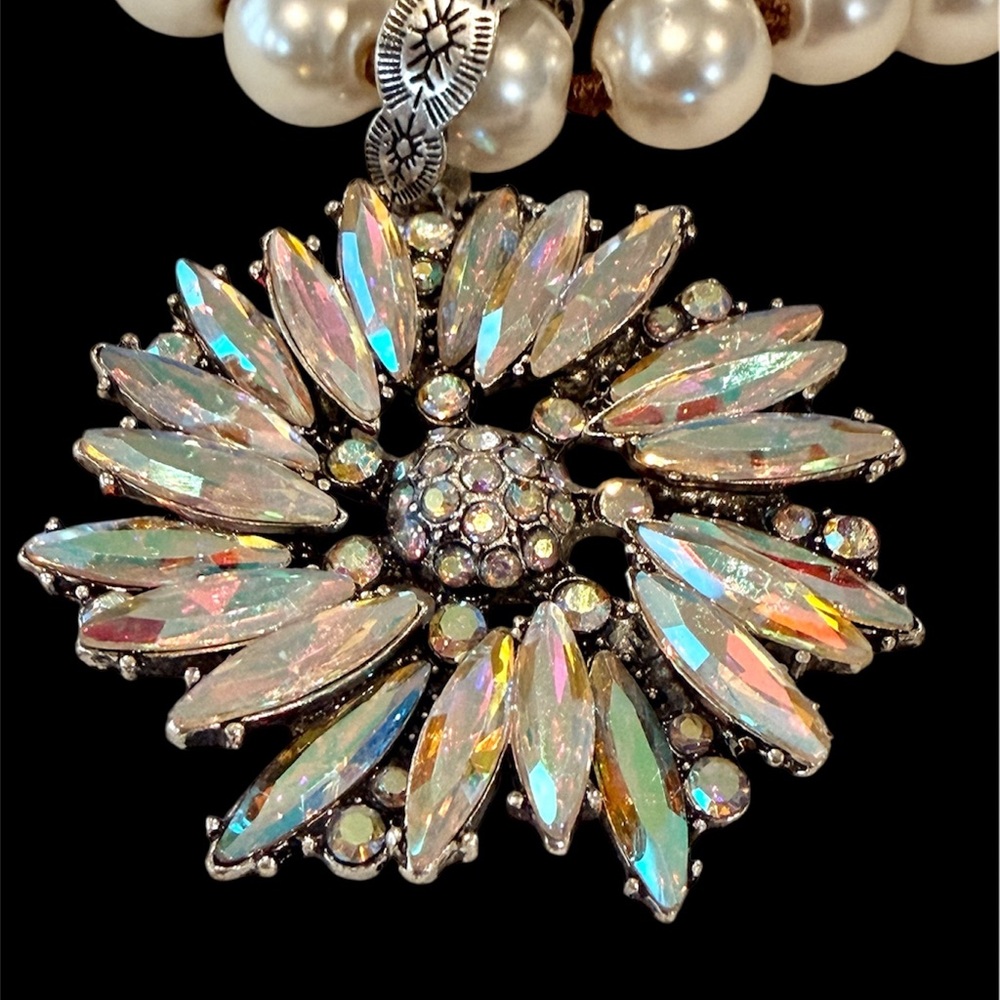 AB crystal pendant on glowing pearl-like strand